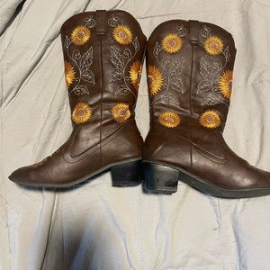Brown fake leather cowgirl boots with sunflower detail and embroidered lining